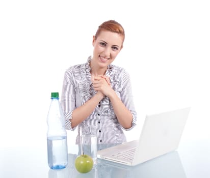 young business woman on computer with snack isolated on white