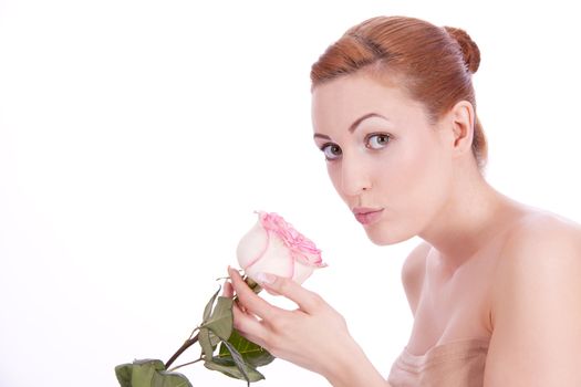 beautiful young woman holding pink rose isolated on white