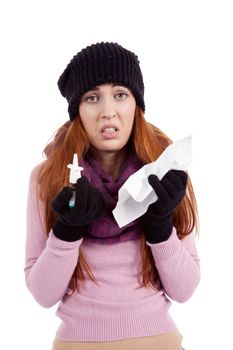 woman with tissue and spray feels unwell with flu isolated on white