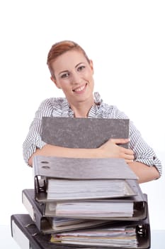 business woman in office looks at unbelievable folder stack isolated on white