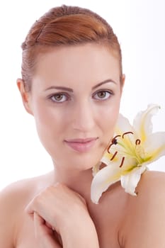 beautiful natural woman face with flower isolated on white
