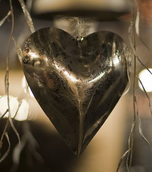 decoration from a metal hart with reflection