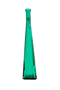 Tall green glass vintage bottle isolated on white background.