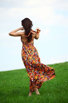 happy woman on green grass 