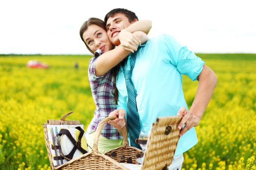 lovers hug on picnic