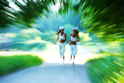 woman run by sunny park alley