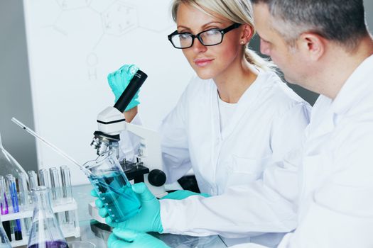 Chemistry Scientist conducting experiments in laboratory