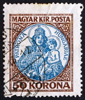 HUNGARY - CIRCA 1921: a stamp printed in the Hungary shows Madona and Child, circa 1921