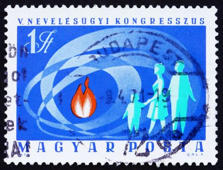 HUNGARY - CIRCA 1970: a stamp printed in the Hungary shows Family and Flame, circa 1970