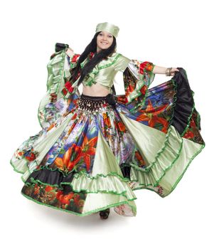 Image of gipsy dancer in traditional dress in motion