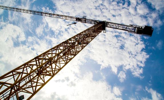 Construction crane at blue sky