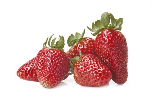 Fresh strawberries isolated on a white background.