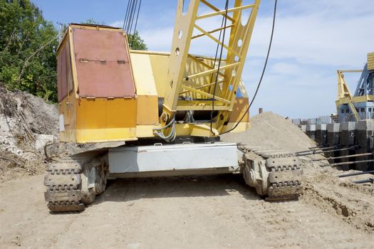 Powerful diesel crane at a construction site