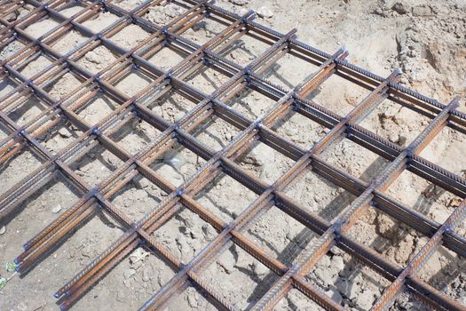 The lattice of rebar at the bottom of pit