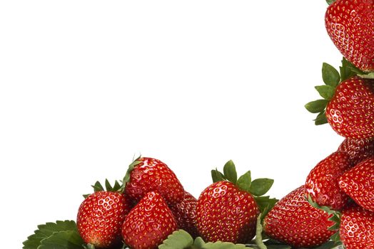 Strawberries with their leaves isolated on a white background