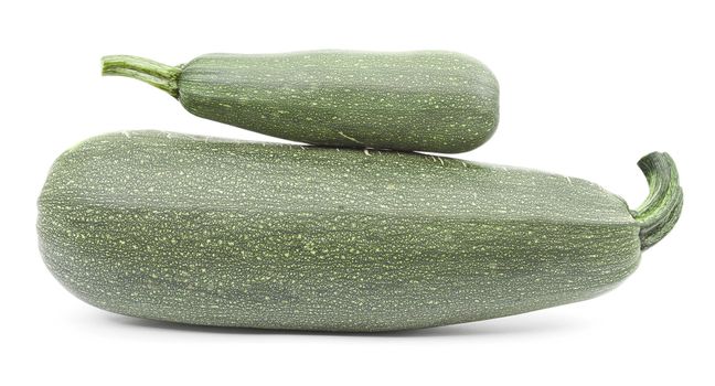 Two large courgettes on a white background