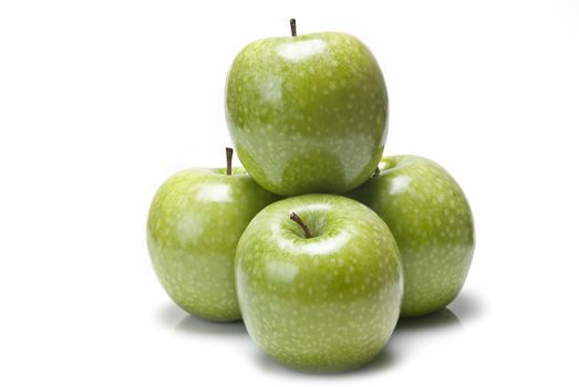 Fresh smith apples  isolated over a white background.