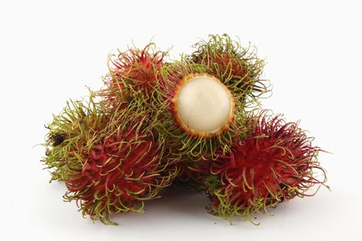 Many Rambutan fruit on white background