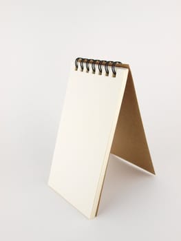 brown notebook on white isolate     