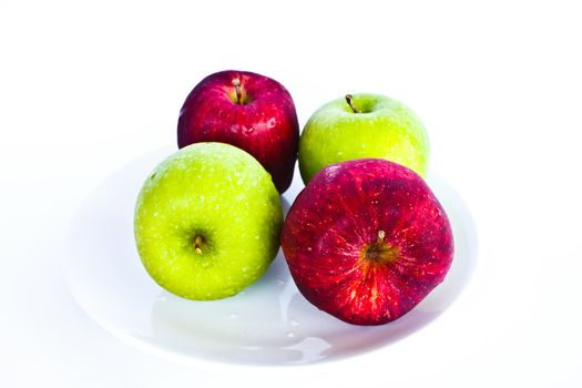 Stock Photo - different concepts - red apple between green apples