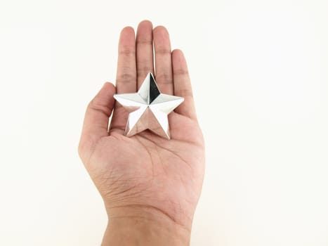 Silver star in hands on white background    