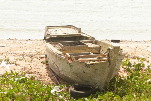 Stock Photo -Old fishing boat floating on the water