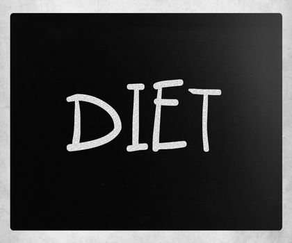 "Diet" handwritten with white chalk on a blackboard