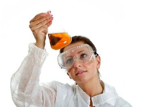 Female scientist in lab coat with chemical glassware. Isolated on white.