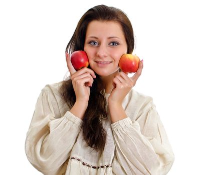 Female in national traditional costume with two apples. Isolated on white.