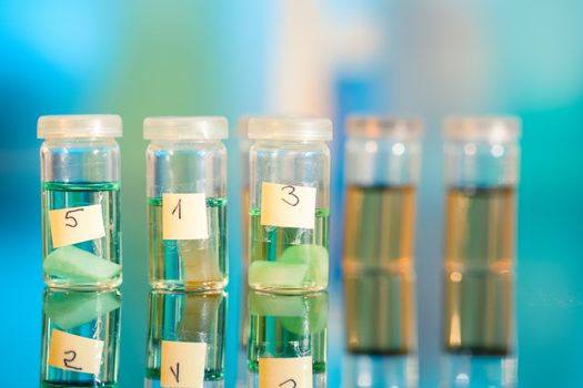 Three samples in plastic vials for microscopy and biopsy tissue . biological laboratory