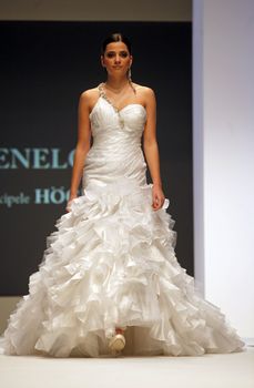 ZAGREB, CROATIA - FEBRUARY 19: Fashion model walks the runway in wedding dress on 'Wedding days' show, February 19, 2012 in Zagreb, Croatia.