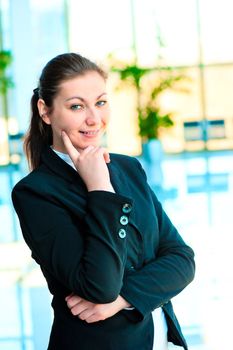 Portrait of smiling successful business people on the background of a blurred office interior