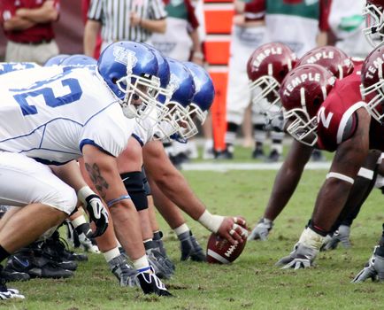 PHILADELPHIA, PA. - SEPTEMBER 26 : Temple Defensive Line face off against Buffalo offensive linemen September 26, 2009 in Philadelphia, PA.