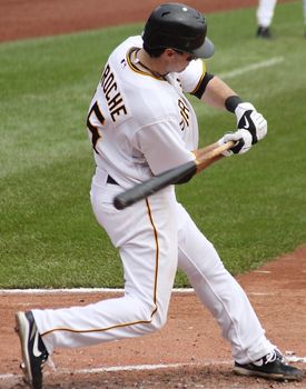 Andy LaRoche of the Pittsburgh Pirates swings at a pitch against Cincinnati Reds on September 24, 2009 in Pittsburgh, PA.
