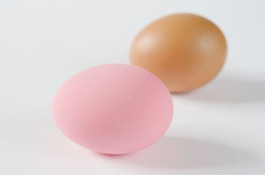 Preserved egg , pink eggs  and  brown eggs on white background