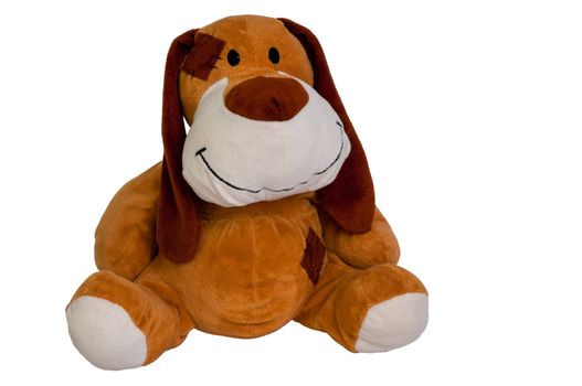 Happy plush toy dog isolated on white