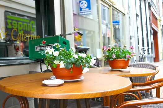 Flowers on the tables of street cafes. Gorinchem. Netherlands 