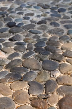 Close up of cobblestones background. High resolution texture