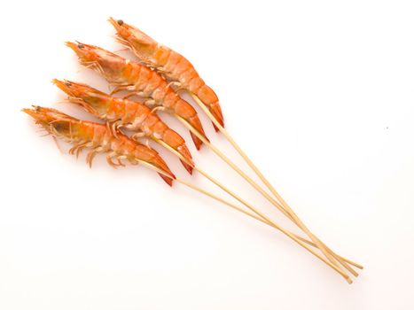 close up of skewers of shrimps