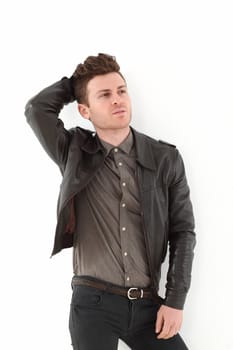 Young russian model on white background with leather jacket