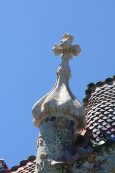 Detail of mosaic in Guell park in Barcelona, part of a building ornament