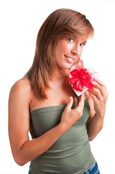 Young woman holding a heart shaped box