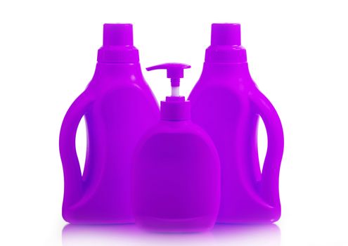 Colored plastic bottles isolated on white background