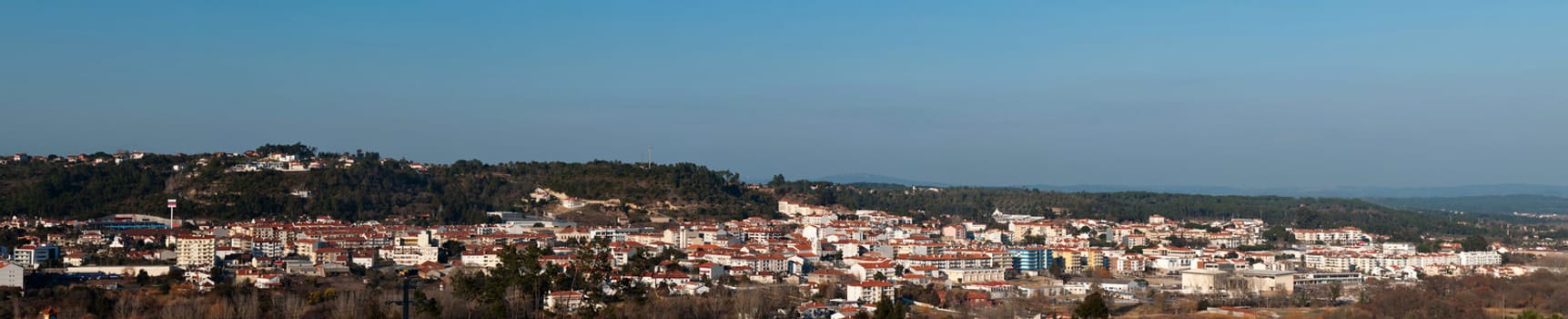 stunning cityscape view of Ourem in Portugal (panoramic picture with blue sky)