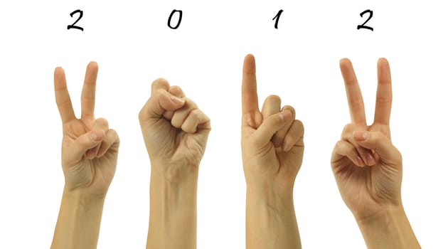 The number 2012 are shown via fingers in creative New Year greeting card