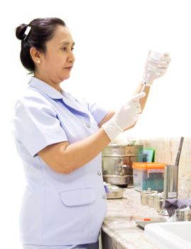 nurse holding syringe on white background.
