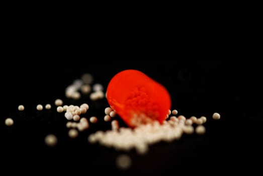 pictures of capsule pills showing the medicine inside it