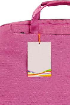 The product label attached to the pink bag.