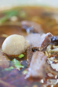 Beef noodle soup with beef balls.