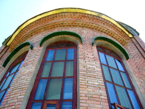 Architecture of a church tower with beautiful windows